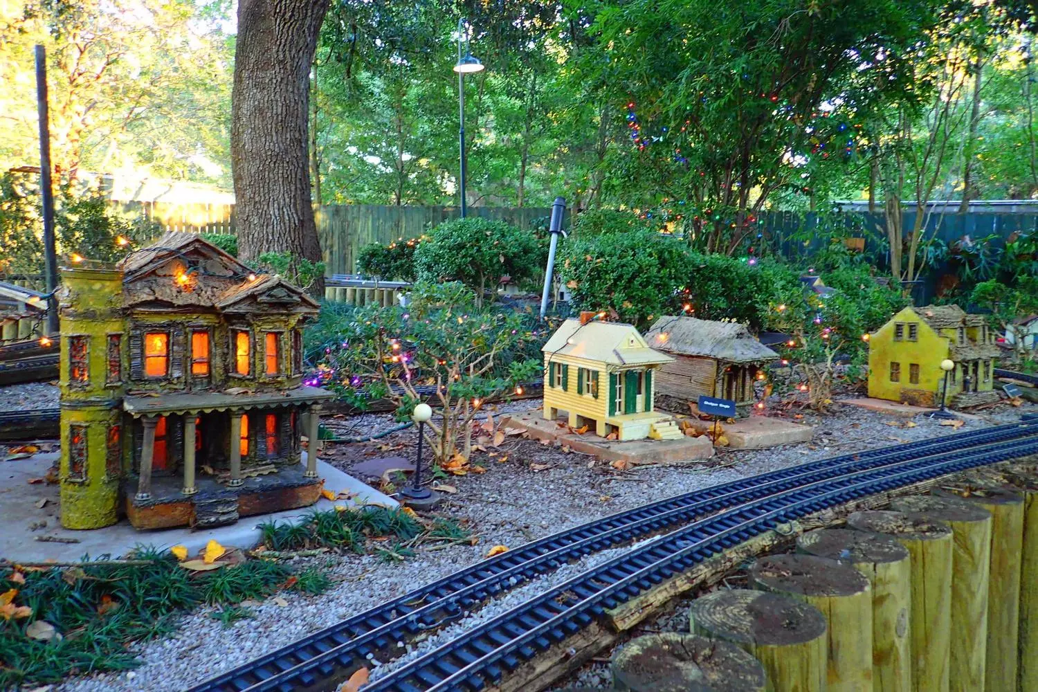 Miniature train and houses made of pinecones at the Historic Train Garden, New Orleans Botanical Garden