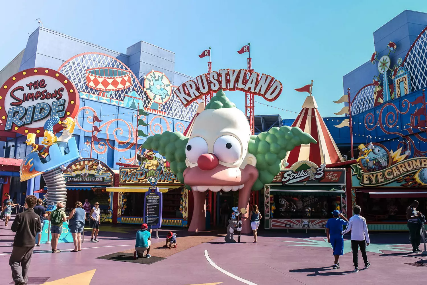 Welcome to Krustyland! The Simpsons-Themed Area at Universal Orlando Resort Colorful entrance to Krustyland at Universal Studios Florida, featuring vibrant Simpsons-themed attractions, cartoonish decor, and the iconic Krusty the Clown face logo