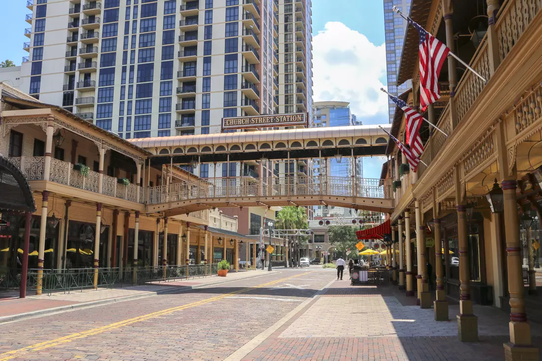 Photo of a street with American flags