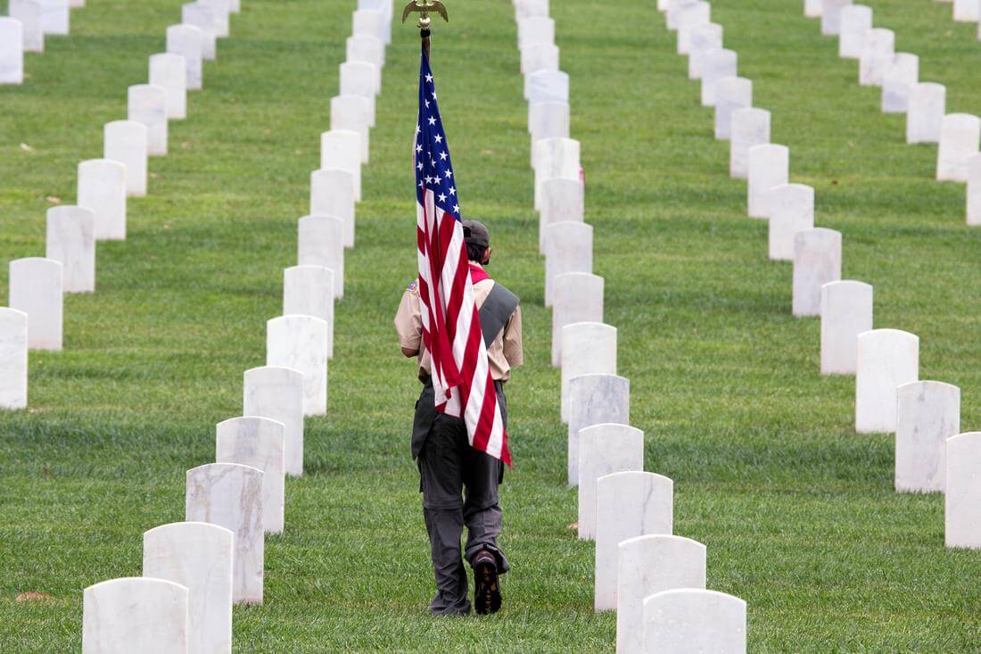 Los Angeles National Cemetery - worker photo with American flag - American Butler