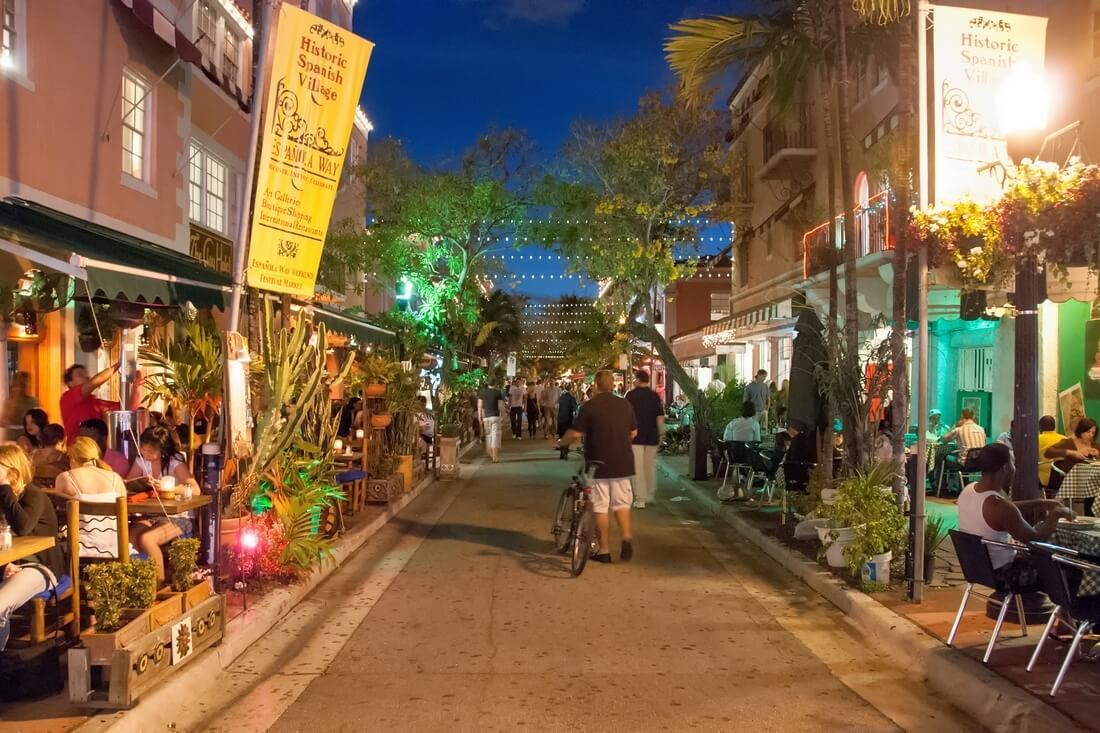 Espanola Way street in South Beach — walking promenade evening photo — American Butler