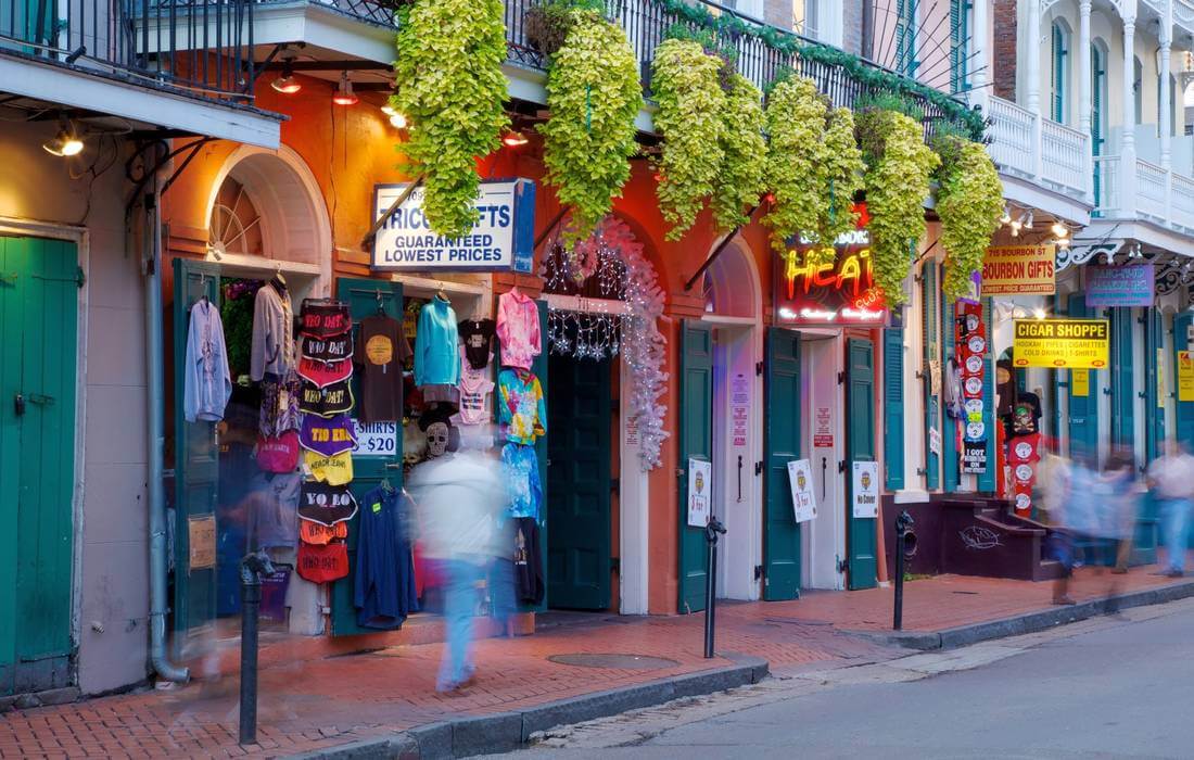 Bourbon Street, New Orleans - photo of the famous city street - American Butler