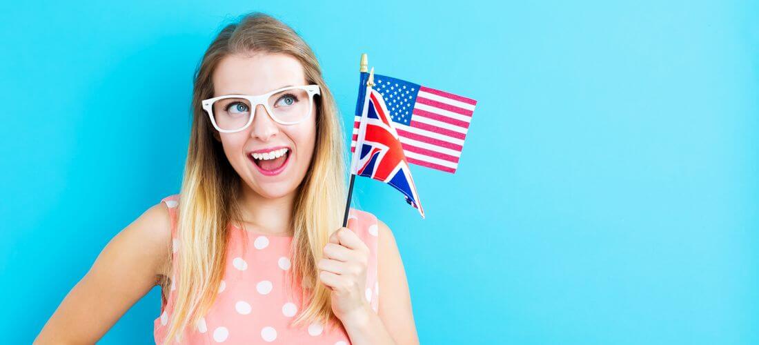 Language schools in Miami — photo of a beautiful girl with the flags of the USA and Britain — American Butler