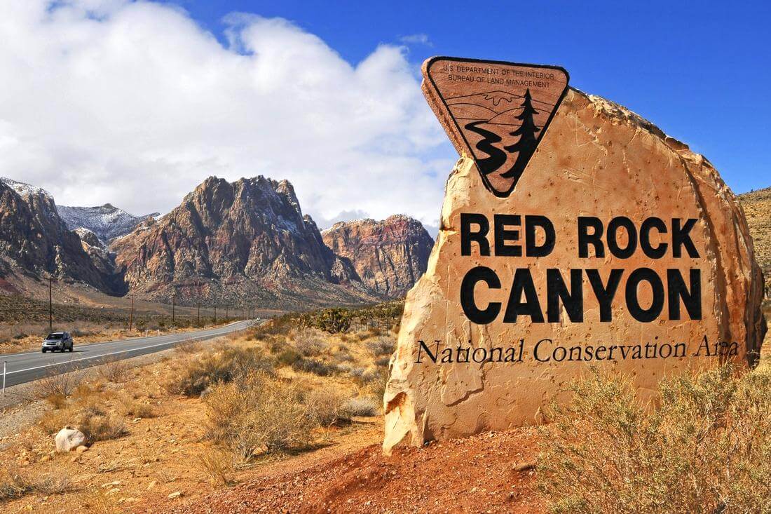 The sign of the Red Canyon Reserve in Las Vegas - American Butler