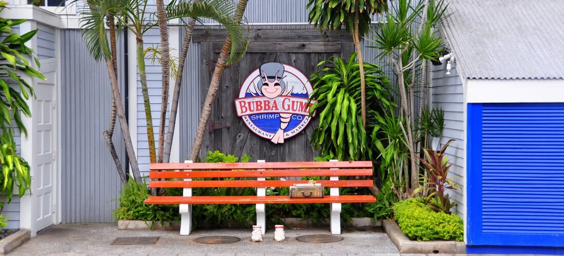 Bubba Gump Restaurant in Miami — photo of a bench in front of a restaurant — American Butler