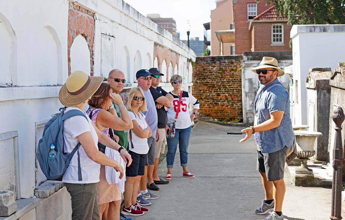 New Orleans Walking Tour - Photo of a Group of Tourists Walking - American Butler