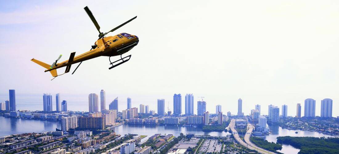 Miami Helicopter Hire for Celebrations and Weddings - helicopter photo over Miami Beach - American Butler