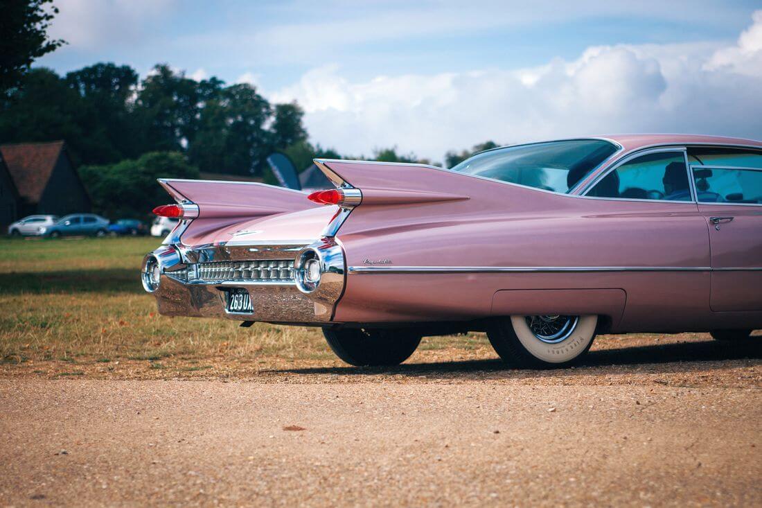 Features Cadillac cars — photo design of wings and fins — American Butler