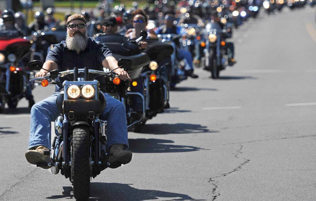 Column of bikers at a motorcycle rally in the US — American Butler