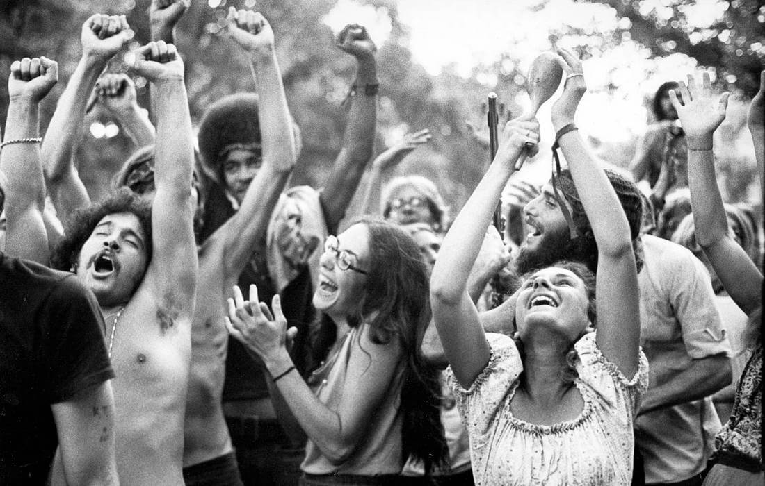 Hippie Subculture in the USA — photo of dancing hippies at the festival — American Butler