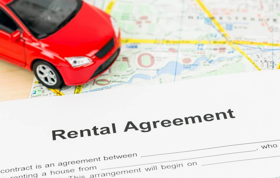 A photo of a car rental and rental contract in the USA — American Butler