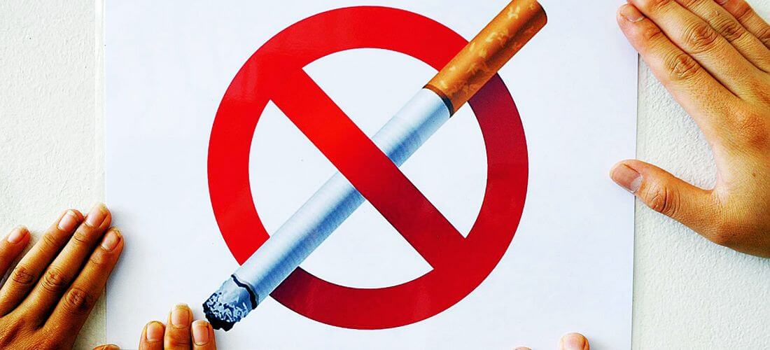 Борьба с курением в Америке — фото знака с перечеркнутой сигаретой — American Butler
