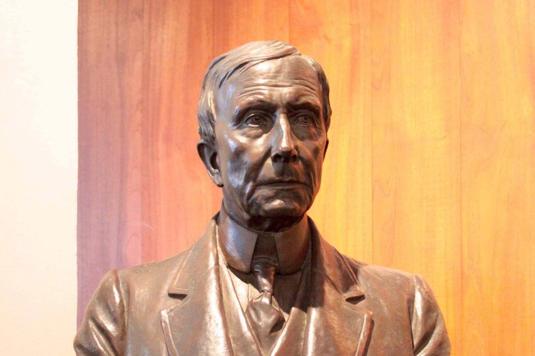 Photo of John D. Rockefeller's pedestal — billionaire fortune — American Butler